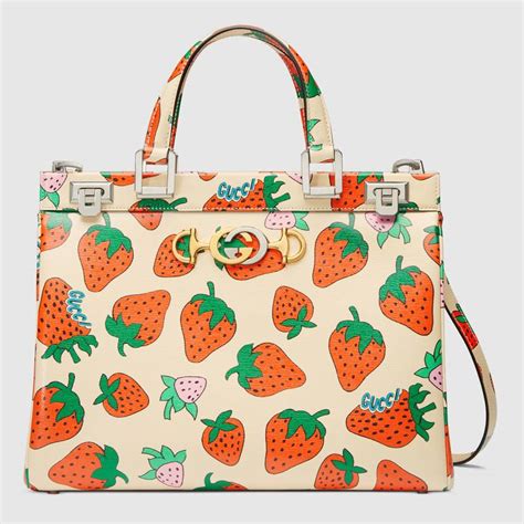 strawberry purse gucci|Gucci bag with strawberry charm.